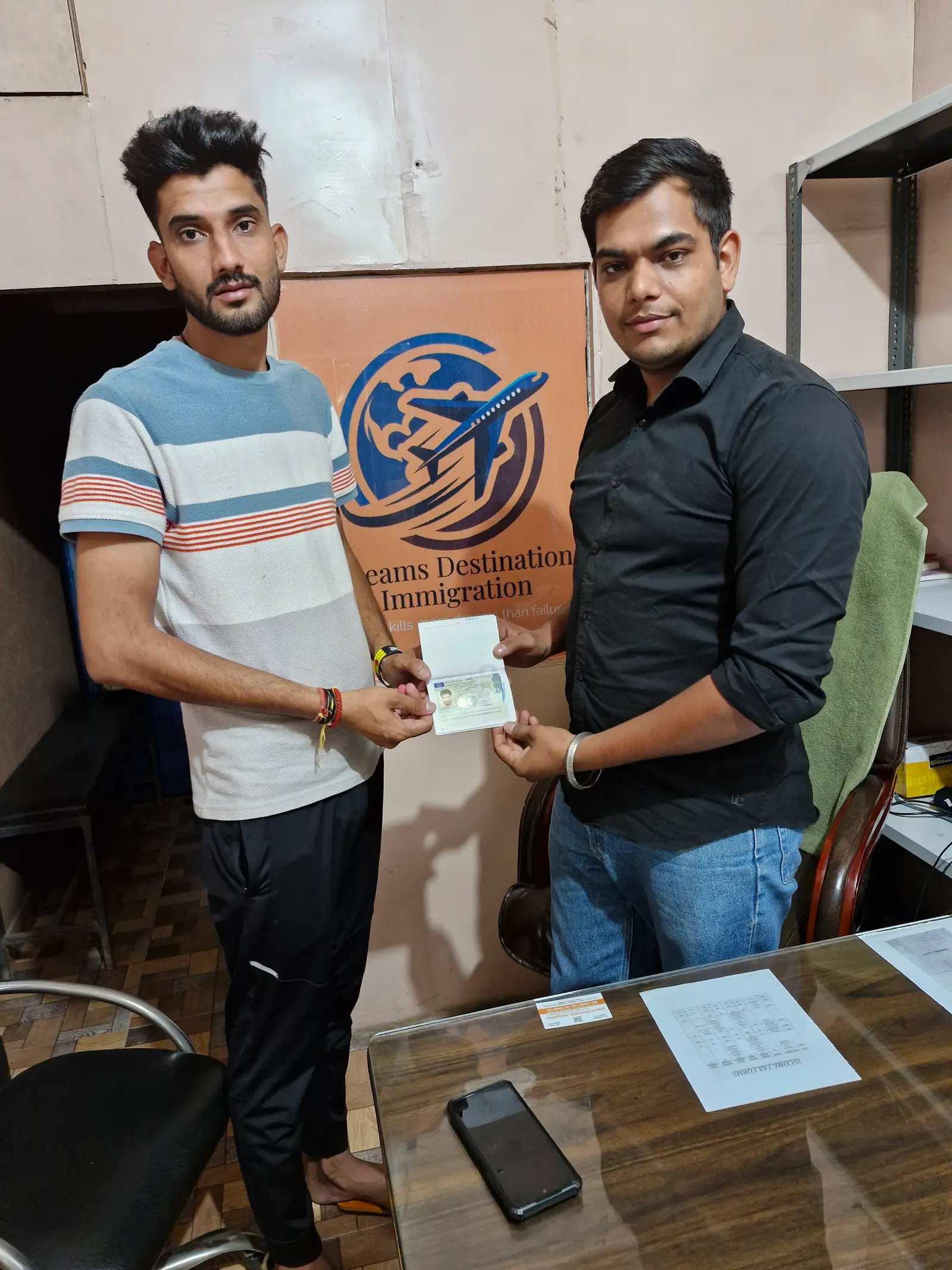 Client receiving visa at Dreams Destination Hisar office